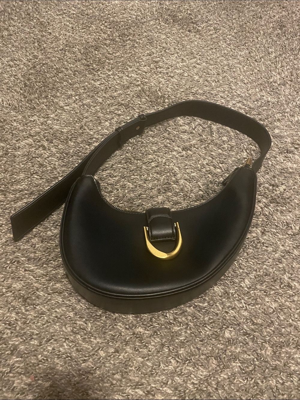 Structured Black Crescent Shoulder Bag with Gold Accent